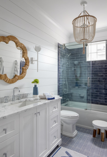 3 Design Tricks To Make A Narrow Bathroom Look Larger