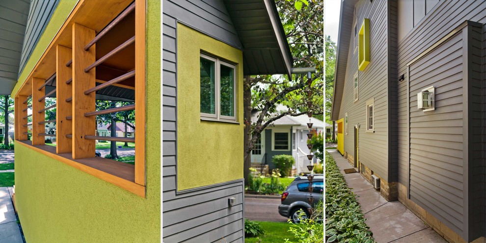 Inspiration for a small eclectic two-storey stucco green exterior in Minneapolis.