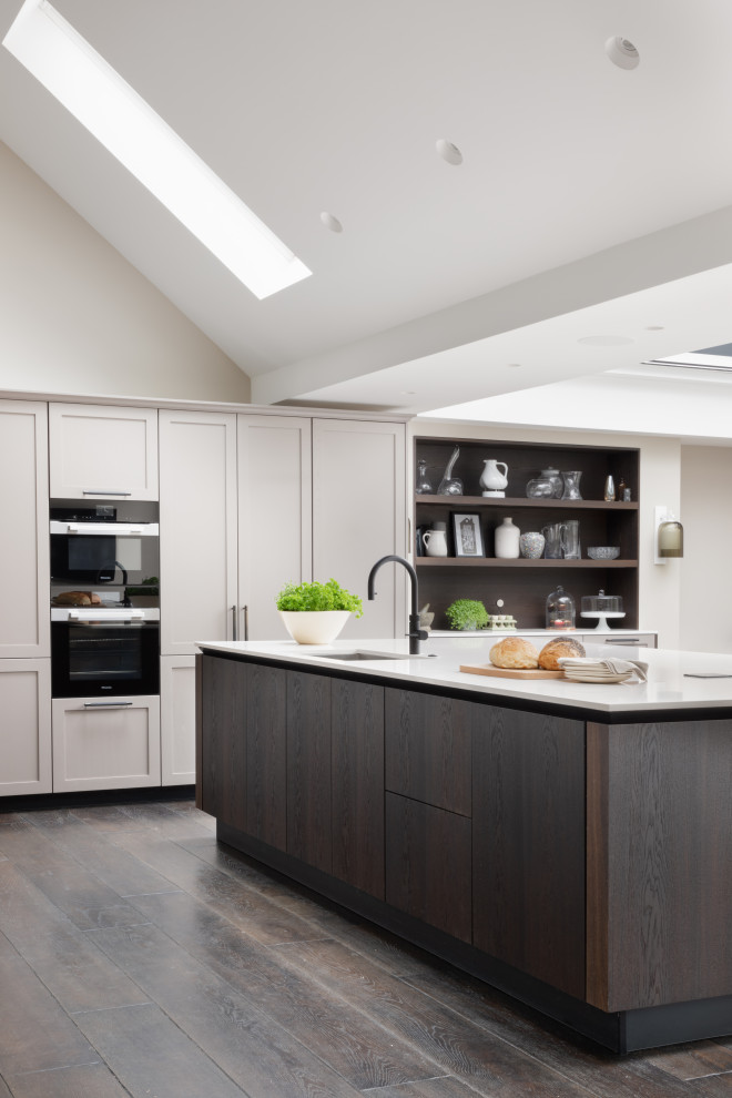 Inspiration for a large classic open plan kitchen in Hampshire with an island.