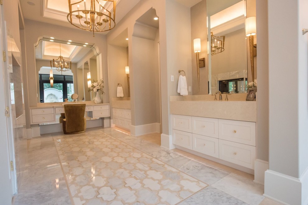 Design ideas for a large transitional master bathroom in Other with shaker cabinets, white cabinets, beige walls, marble floors, an integrated sink, engineered quartz benchtops, grey floor and beige benchtops.
