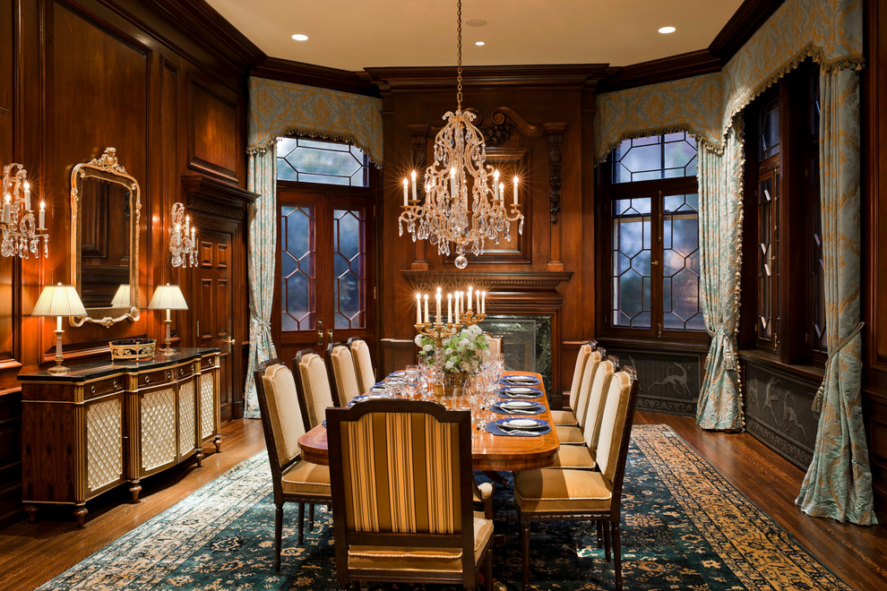 Inspiration for a traditional dining room in Philadelphia with dark hardwood floors and a standard fireplace.