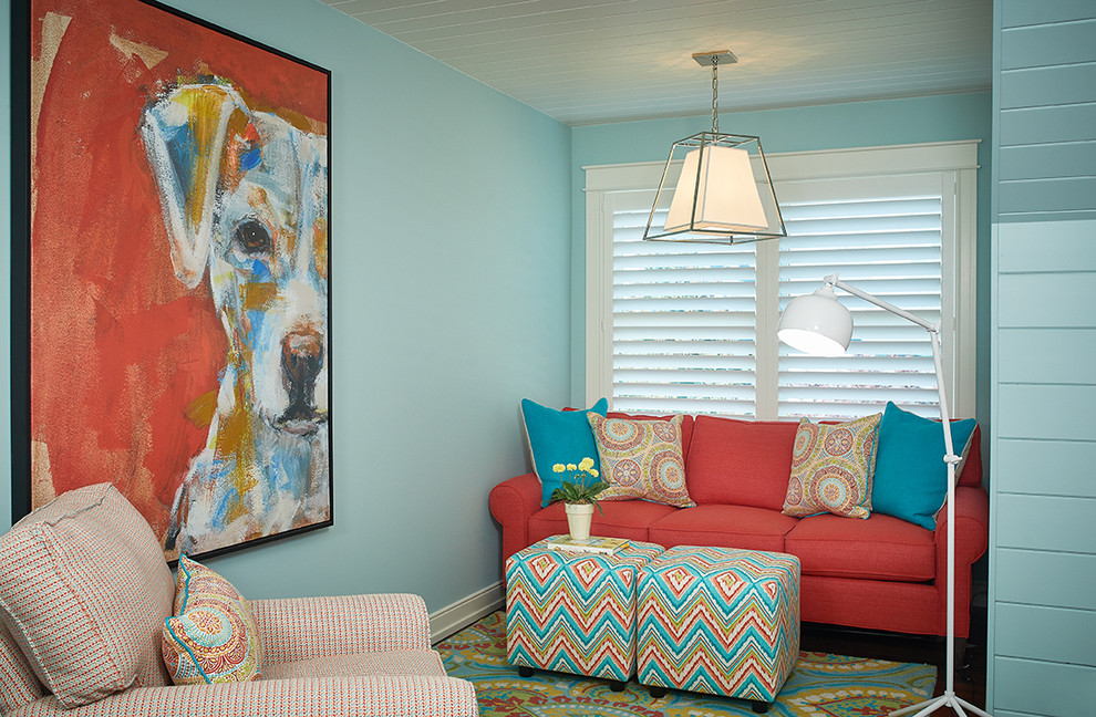 Beach House Bunk Room - Inspiration for a coastal gender-neutral childrens' room remodel in Grand Rapids with blue walls
