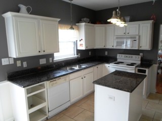 Caledonia Granite for White Cabinets - Traditional - Kitchen ...