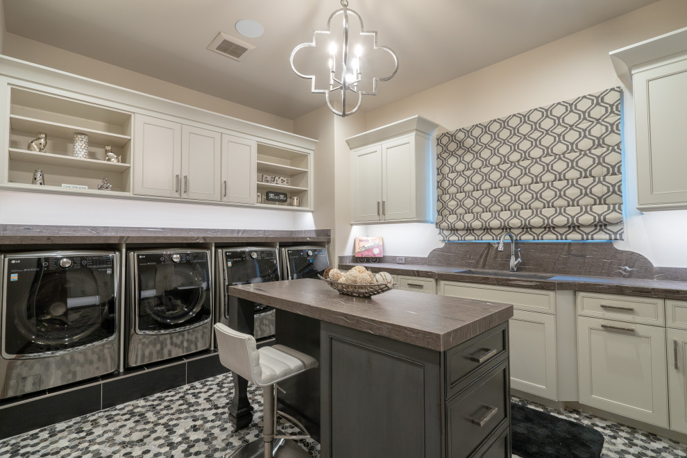 This is an example of a mediterranean laundry room in Phoenix.