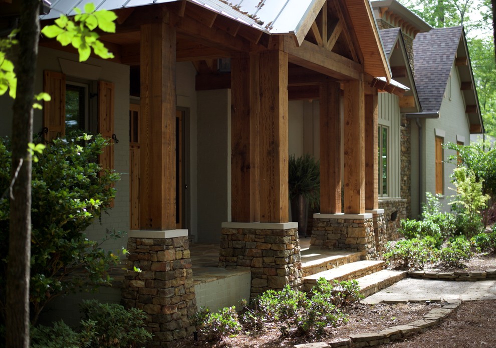 Inspiration for a large rustic two-story exterior home remodel