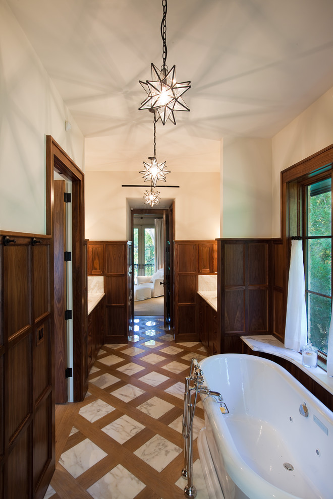 Photo of a traditional bathroom in Austin with a freestanding tub.