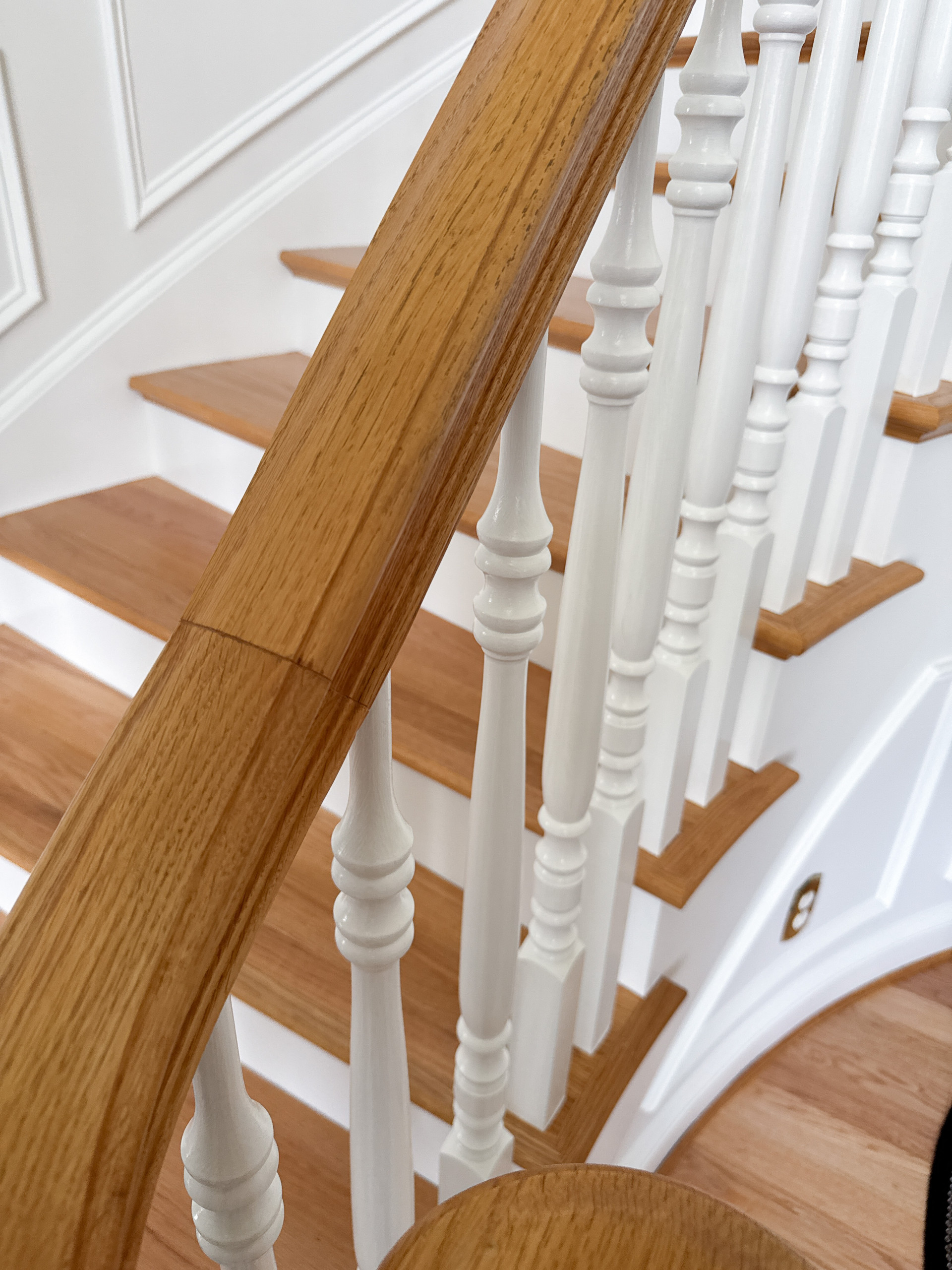 Project #161 | Curved Red Oak Foyer Staircase, 26 Years Later