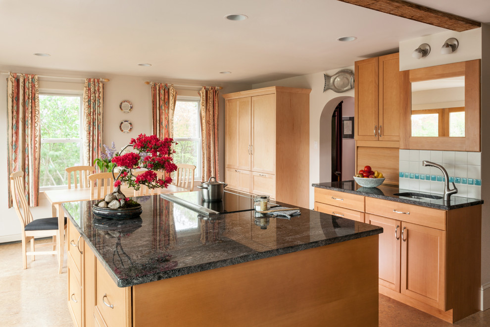 Eat-in kitchen - mid-sized transitional l-shaped cork floor eat-in kitchen idea in Boston with an undermount sink, recessed-panel cabinets, light wood cabinets, granite countertops, beige backsplash, ceramic backsplash, stainless steel appliances, white walls and an island