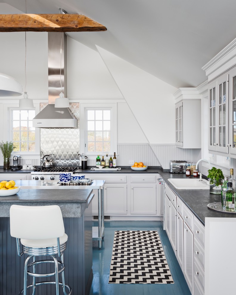 Design ideas for a large transitional l-shaped eat-in kitchen in New York with a drop-in sink, shaker cabinets, white cabinets, soapstone benchtops, white splashback, timber splashback, stainless steel appliances, painted wood floors, with island and blue floor.