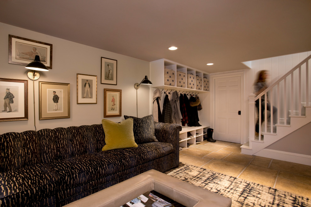 Inspiration for a mid-sized transitional concrete floor and beige floor entryway remodel in Boston with beige walls