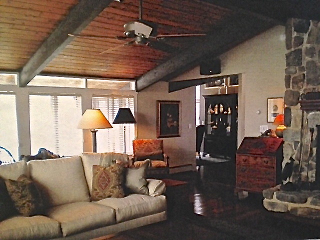 Example of a country family room design in Other