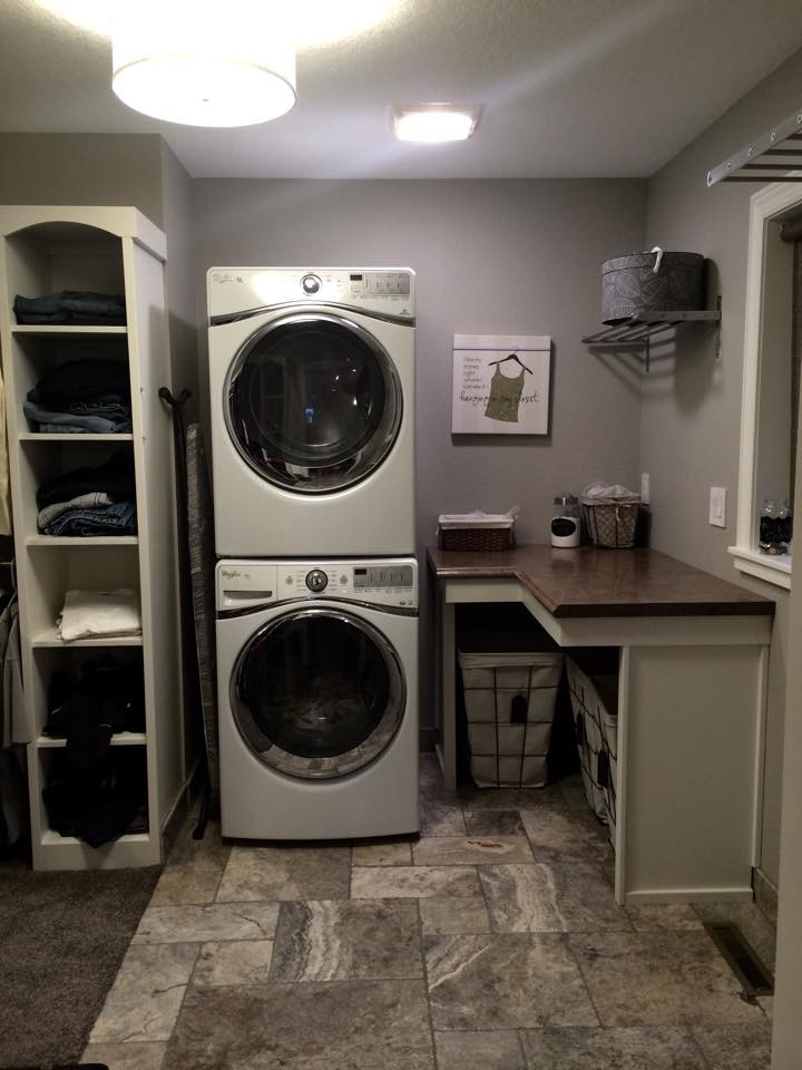 Inspiration for a rustic laundry room remodel in Cedar Rapids