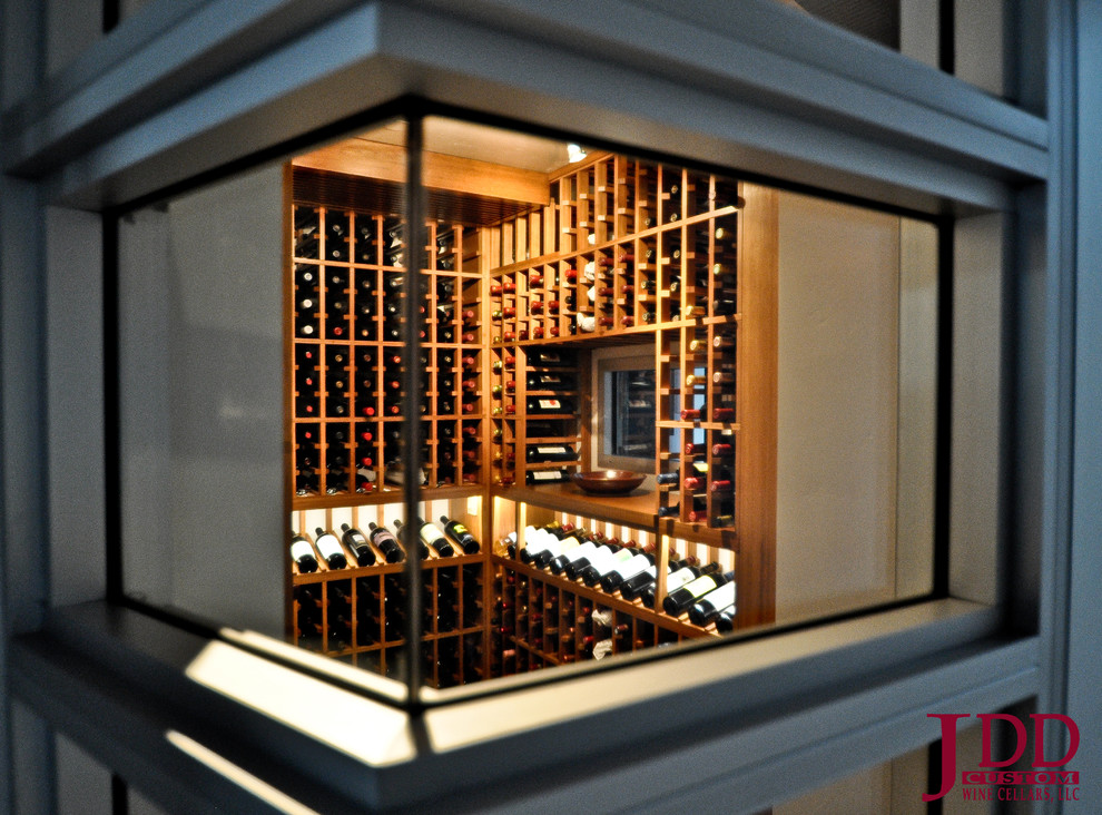 Design ideas for a mid-sized beach style wine cellar in San Diego.