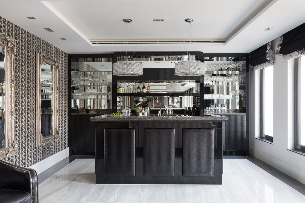 Mid-sized contemporary galley wet bar in Hertfordshire with an undermount sink, flat-panel cabinets, black cabinets, granite benchtops, mirror splashback, black benchtop and grey floor.