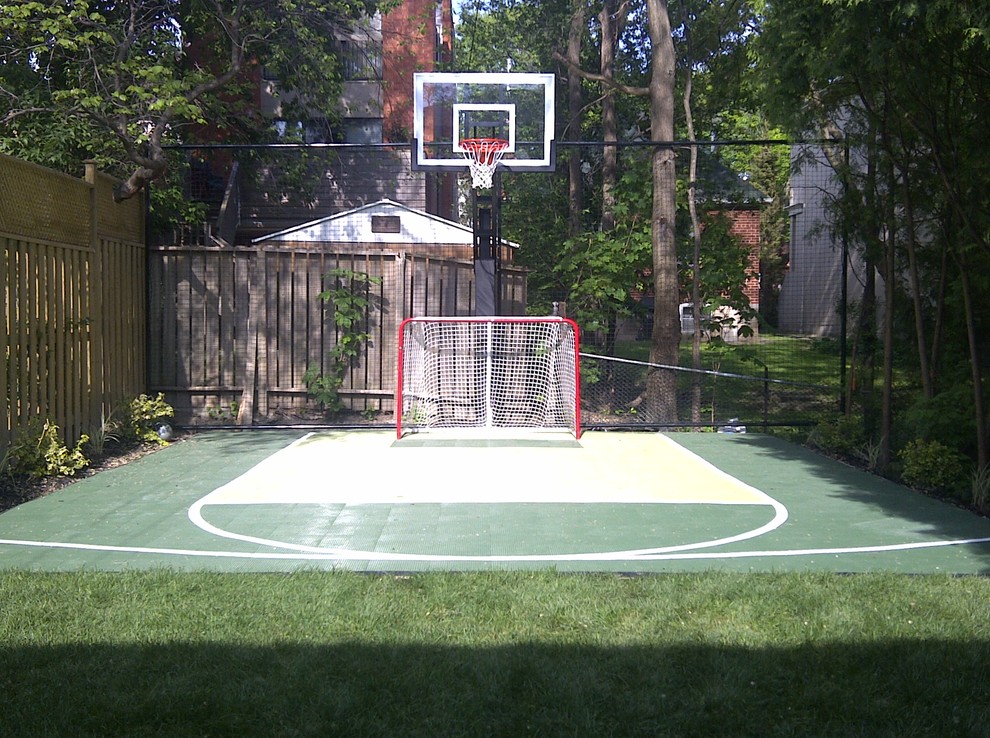 Photo of a small modern backyard full sun outdoor sport court for summer in Toronto with with outdoor playset and concrete pavers.
