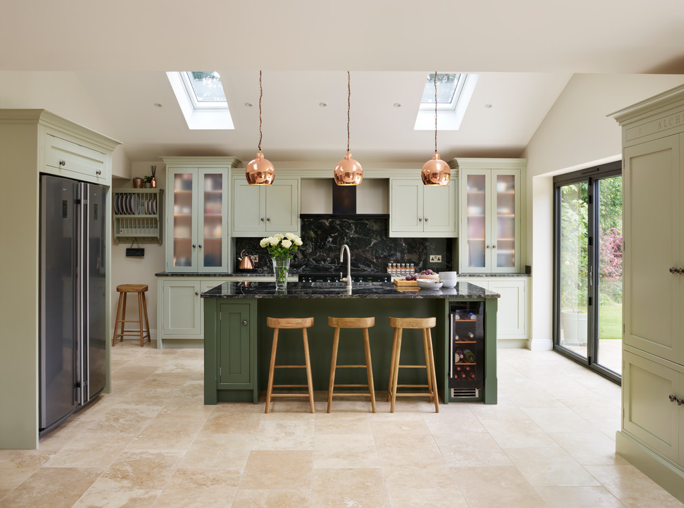 Photo of a large contemporary single-wall open plan kitchen in Essex with green cabinets, granite benchtops, black splashback, stainless steel appliances and with island.