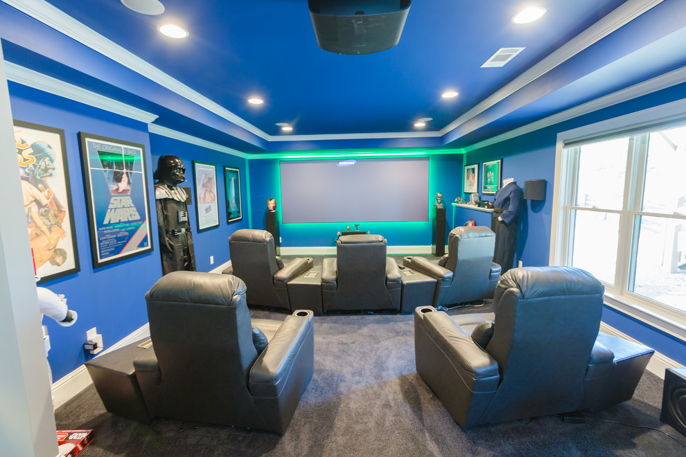 Design ideas for a large modern open concept home theatre in Atlanta with blue walls, carpet and a projector screen.