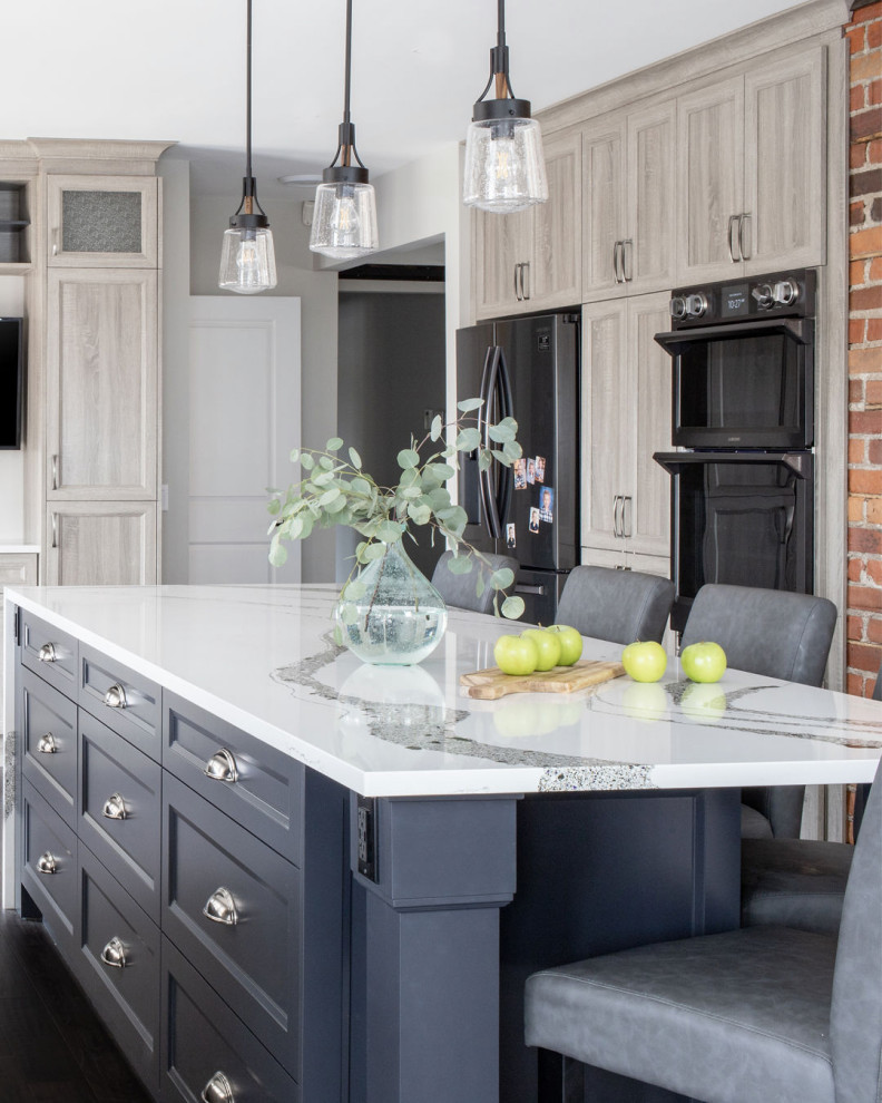 Example of a transitional kitchen design in Toronto