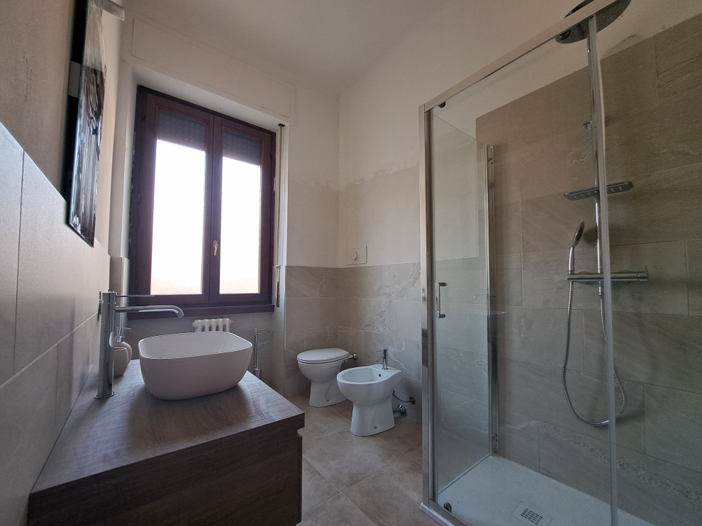 This is an example of a medium sized contemporary shower room bathroom in Other with flat-panel cabinets, dark wood cabinets, a two-piece toilet, porcelain tiles, beige walls, porcelain flooring, a vessel sink, laminate worktops, beige floors, a sliding door, a single sink and a floating vanity unit.