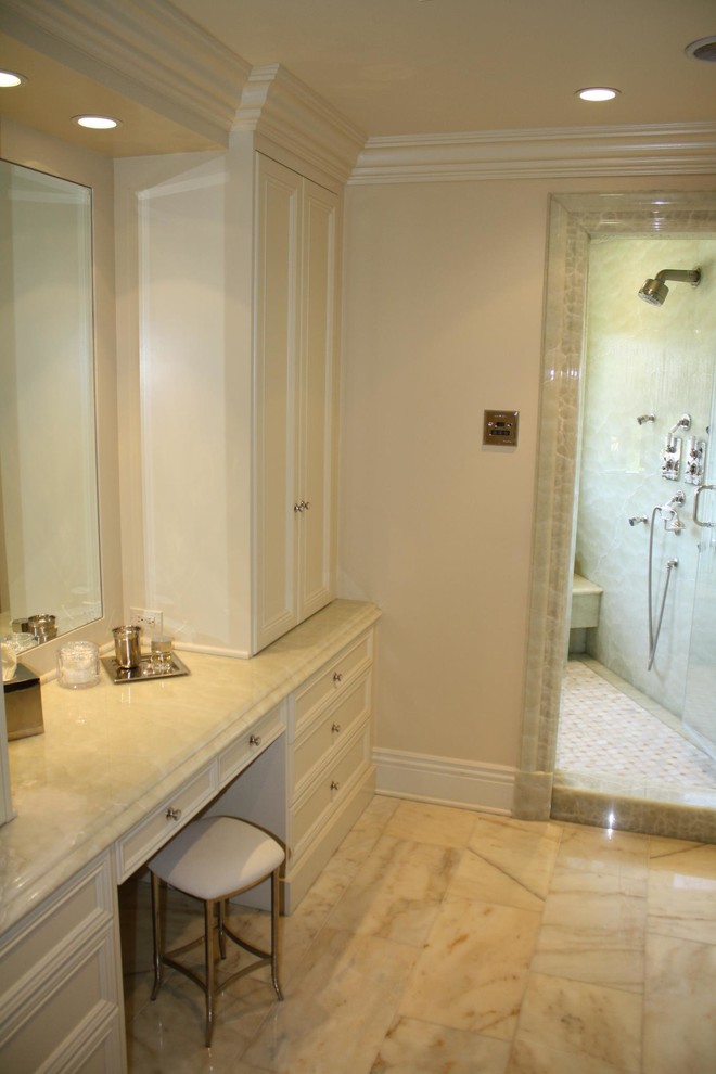 This is an example of an expansive contemporary bathroom in Los Angeles with raised-panel cabinets, white cabinets, onyx benchtops, white tile, stone tile, beige walls, marble floors and with a sauna.