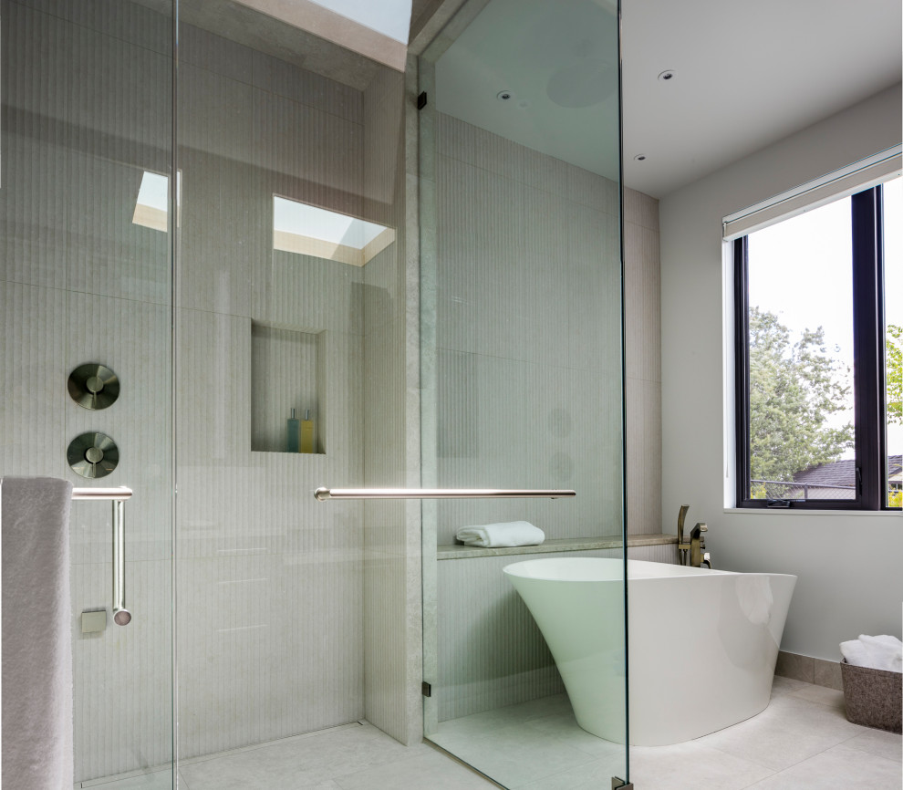 Inspiration for a large transitional master bathroom in Seattle with a curbless shower, gray tile, ceramic tile, white walls, ceramic floors, an undermount sink, grey floor and a hinged shower door.