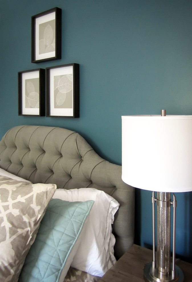 This is an example of a mid-sized transitional guest bedroom in Indianapolis with grey walls and carpet.