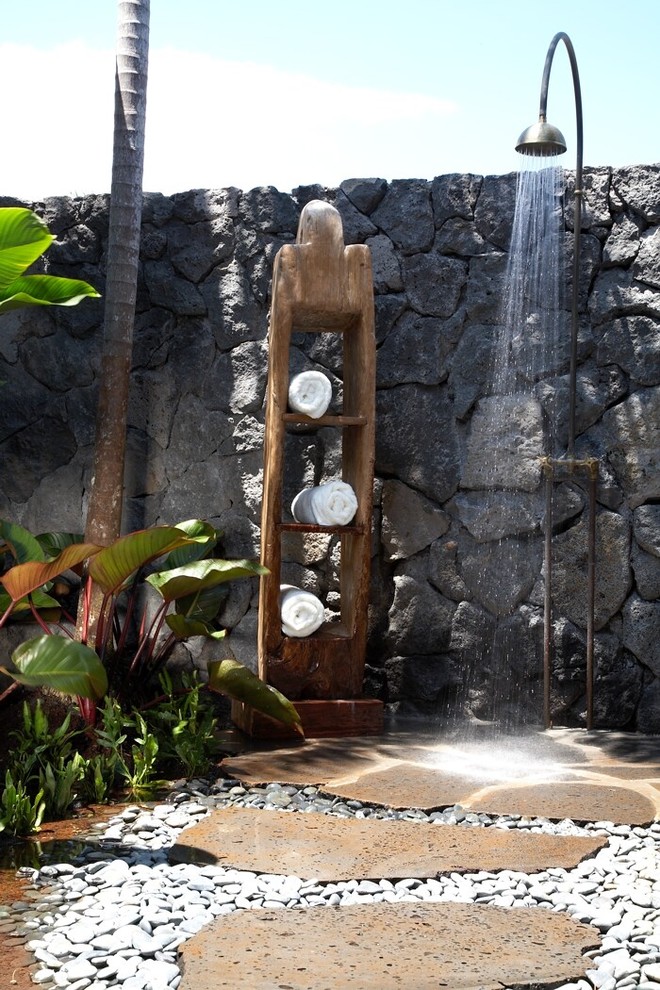 Tropical patio in Hawaii with an outdoor shower.