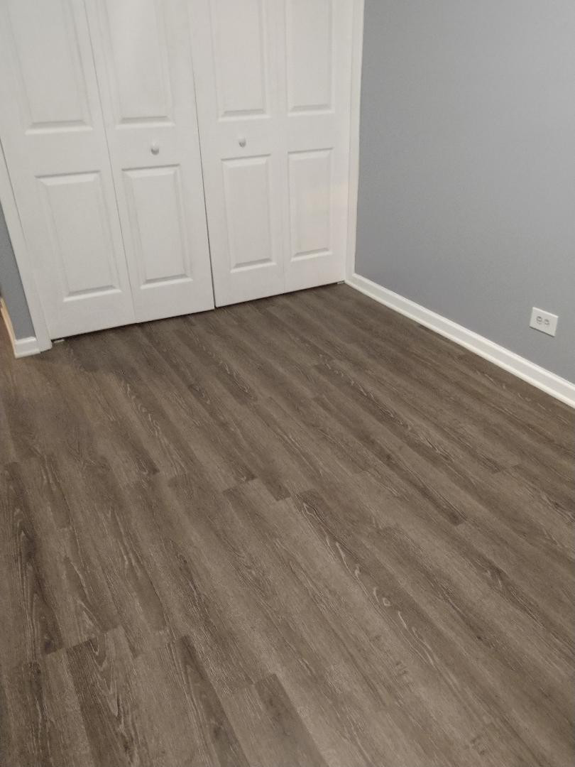 Water proofing vinyl flooring