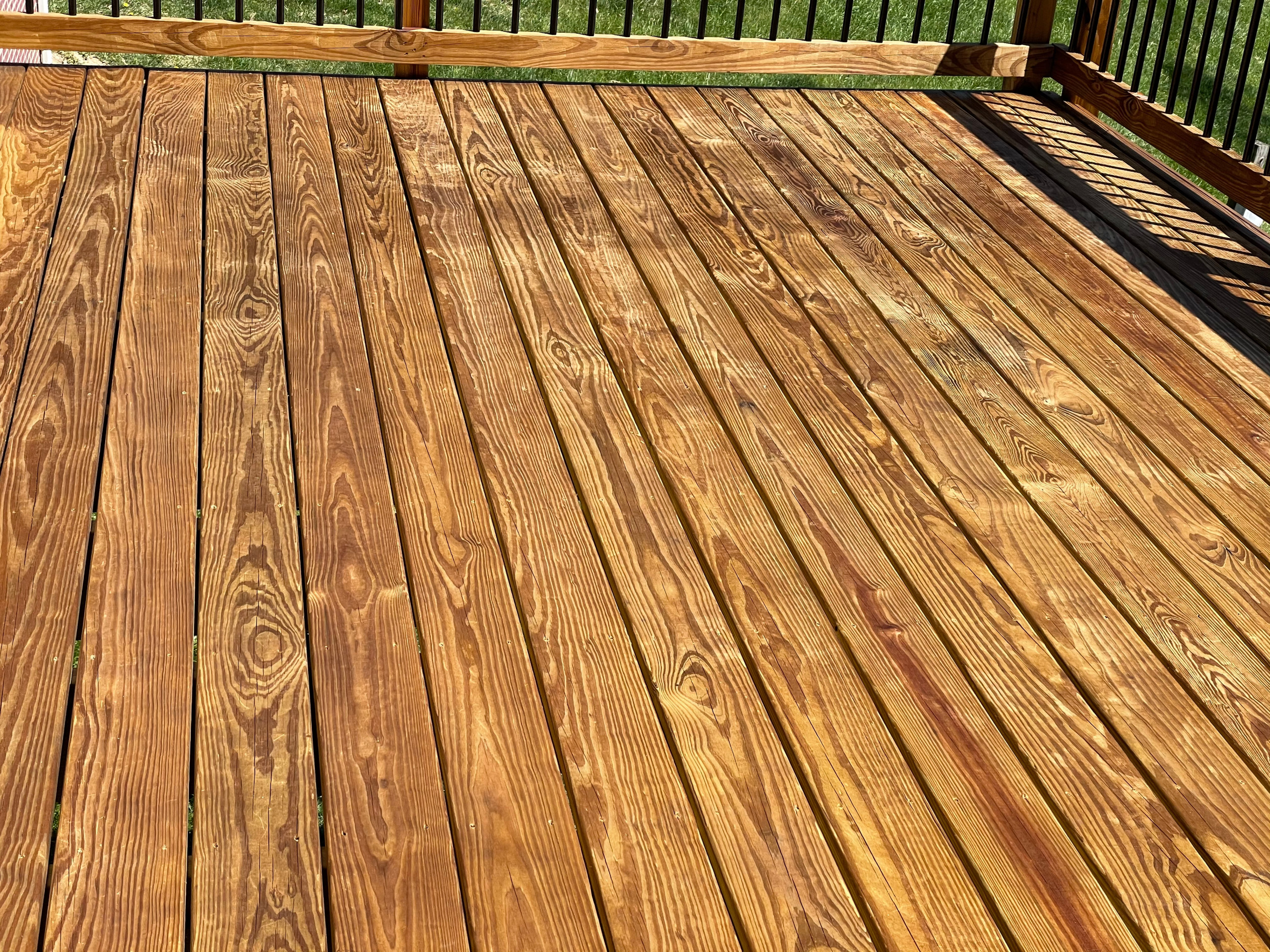 Deck stain and gutters power wash