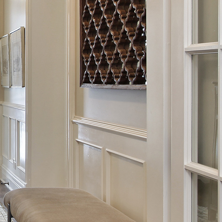 Inspiration for a large transitional dark wood floor foyer remodel in Toronto with beige walls