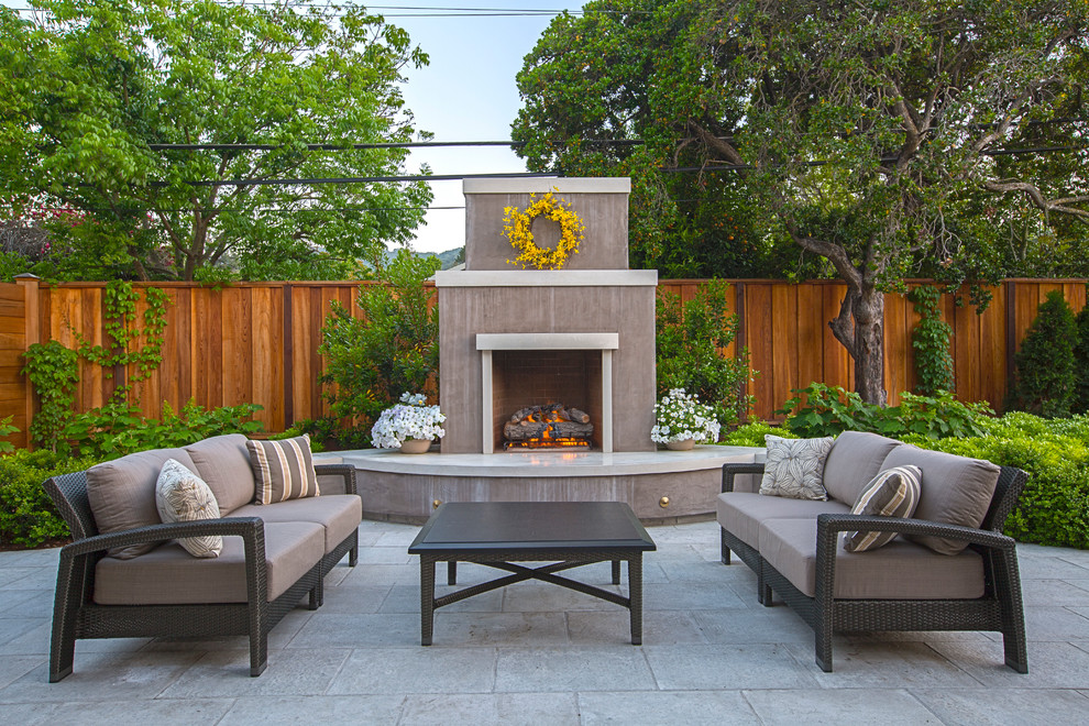 Photo of a traditional backyard patio in San Francisco with no cover and with fireplace.