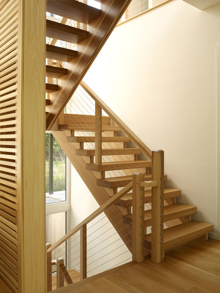 Inspiration for a mid-sized coastal staircase remodel in New York