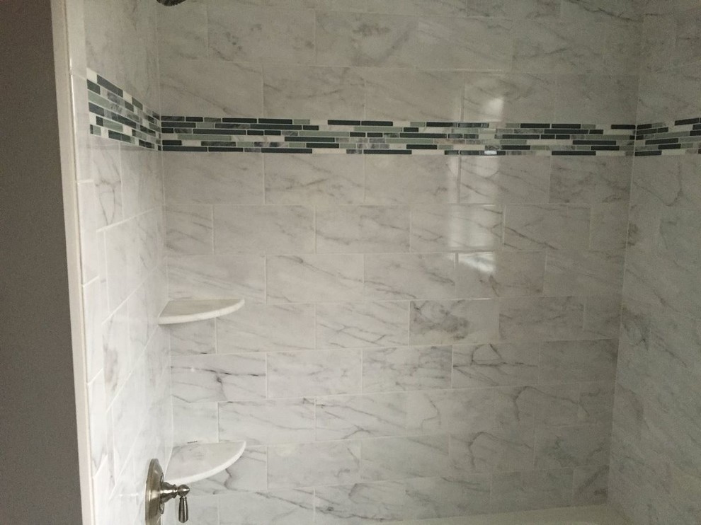 Design ideas for a transitional bathroom in Boston with an alcove tub, a shower/bathtub combo, gray tile, white tile, marble and a shower curtain.