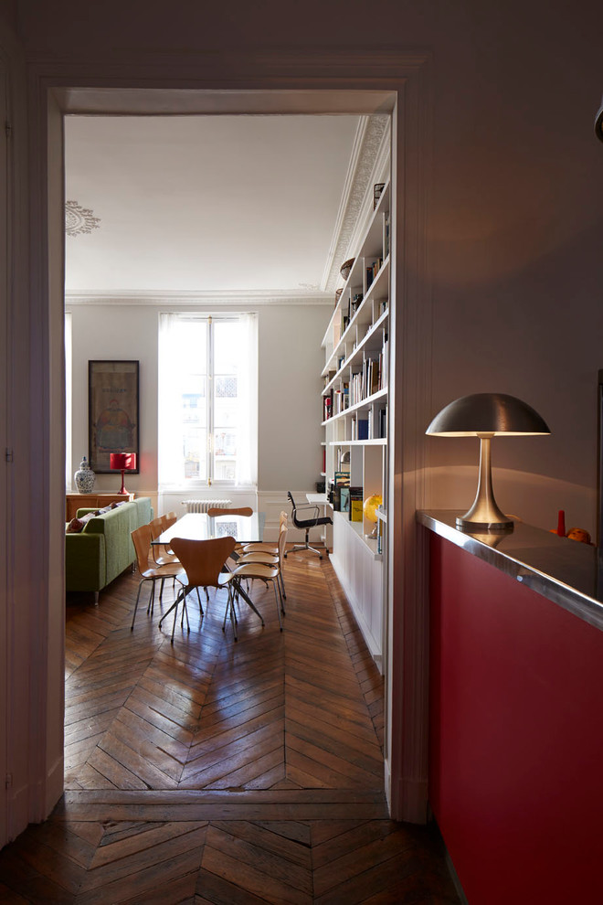 Photo of an eclectic dining room in Paris.