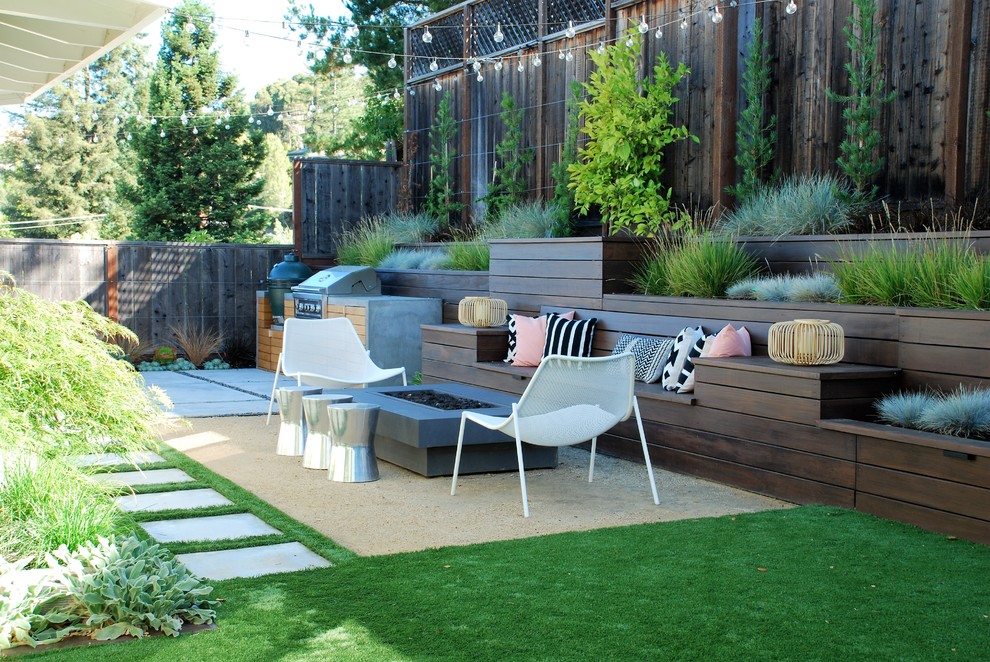 Inspiration for a small contemporary backyard patio in San Francisco with a fire feature and concrete slab.