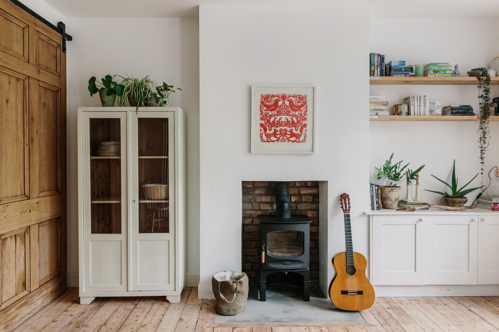 Living room - scandinavian living room idea in London