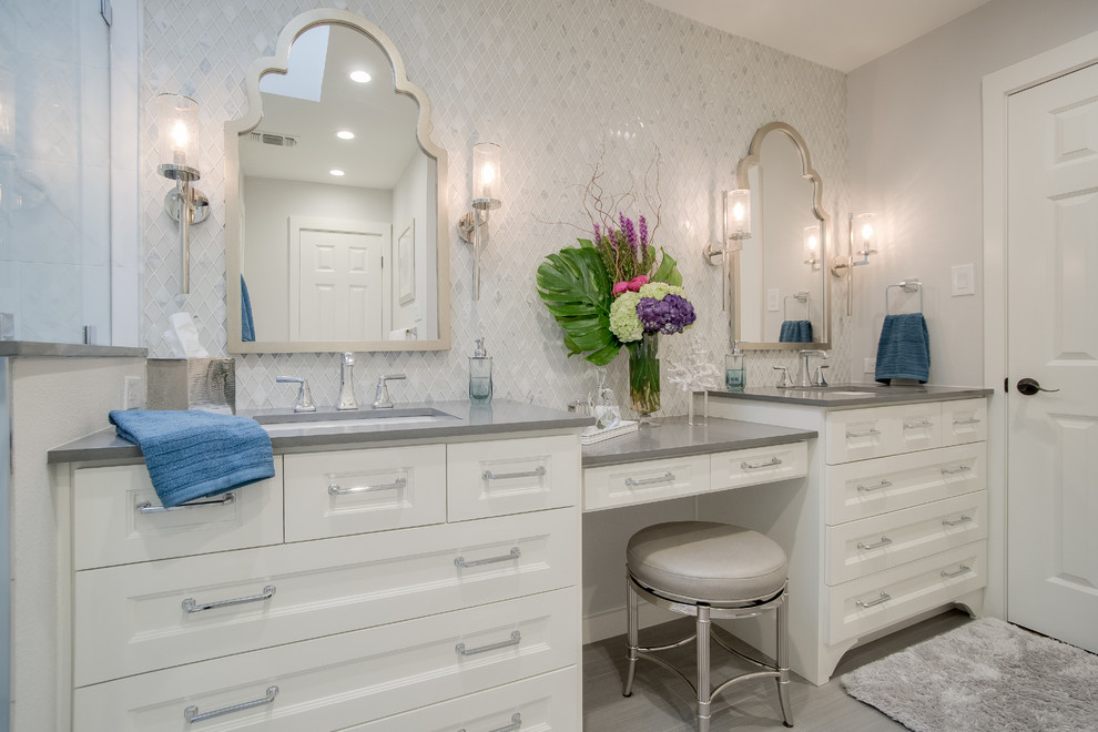 Inspiration for a small transitional master bathroom in Dallas with shaker cabinets, white cabinets, a corner shower, a two-piece toilet, gray tile, glass tile, grey walls, porcelain floors, an undermount sink, engineered quartz benchtops, grey floor and a hinged shower door.