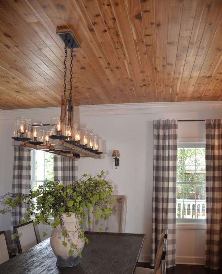 Inspiration for a large transitional dark wood floor and brown floor dining room remodel with white walls and no fireplace
