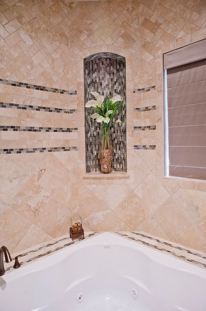 Small traditional 3/4 bathroom in Austin with raised-panel cabinets, distressed cabinets, a hot tub, an open shower, a one-piece toilet, multi-coloured tile, glass sheet wall, beige walls, travertine floors, a vessel sink and granite benchtops.