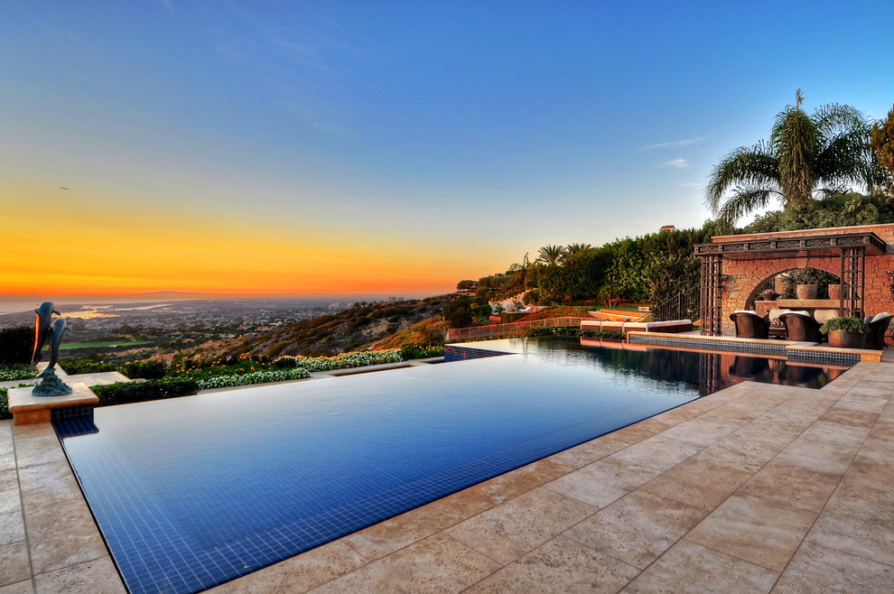 Photo of a large tropical pool in Orange County.