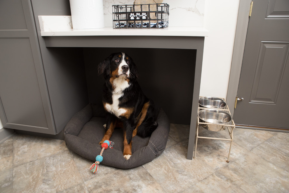 Example of a mid-sized transitional porcelain tile and gray floor mudroom design in Chicago with white walls and a gray front door