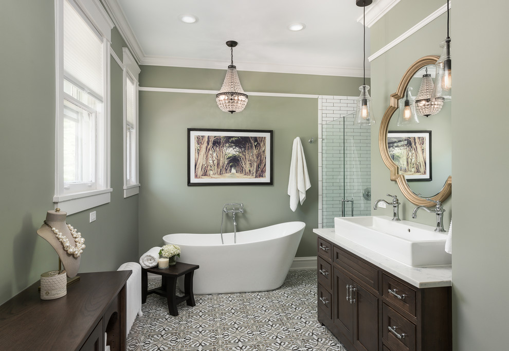 Design ideas for a country master bathroom in Charlotte with dark wood cabinets, a freestanding tub, subway tile, green walls, ceramic floors, engineered quartz benchtops, white tile, a vessel sink, multi-coloured floor, a hinged shower door and beaded inset cabinets.