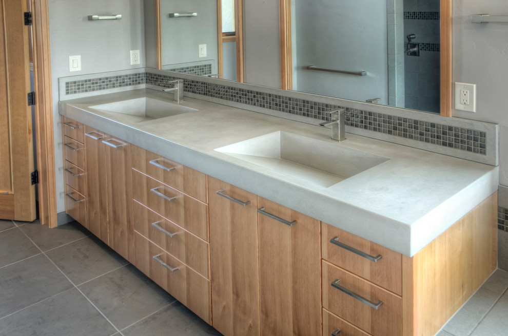 Inspiration for a transitional master bathroom in Other with an integrated sink, flat-panel cabinets, light wood cabinets, concrete benchtops, multi-coloured tile, glass tile and porcelain floors.
