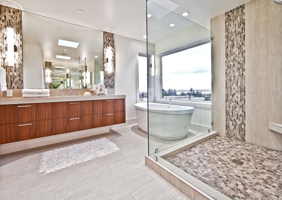Design ideas for a contemporary master bathroom in Seattle with flat-panel cabinets, medium wood cabinets, a freestanding tub, a corner shower and grey floor.