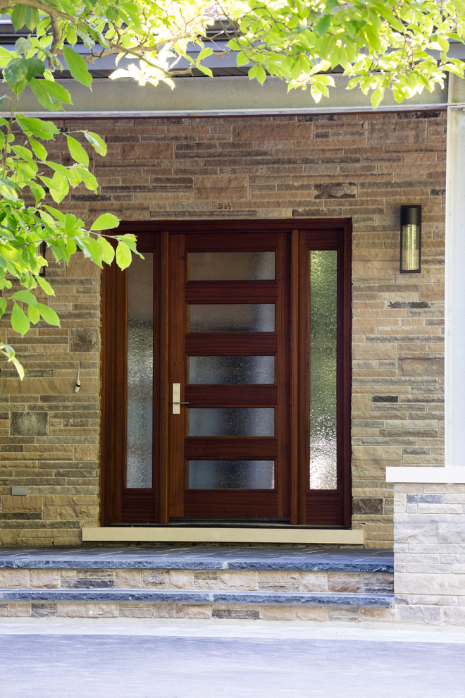 Design ideas for a contemporary entryway in Toronto with a single front door.