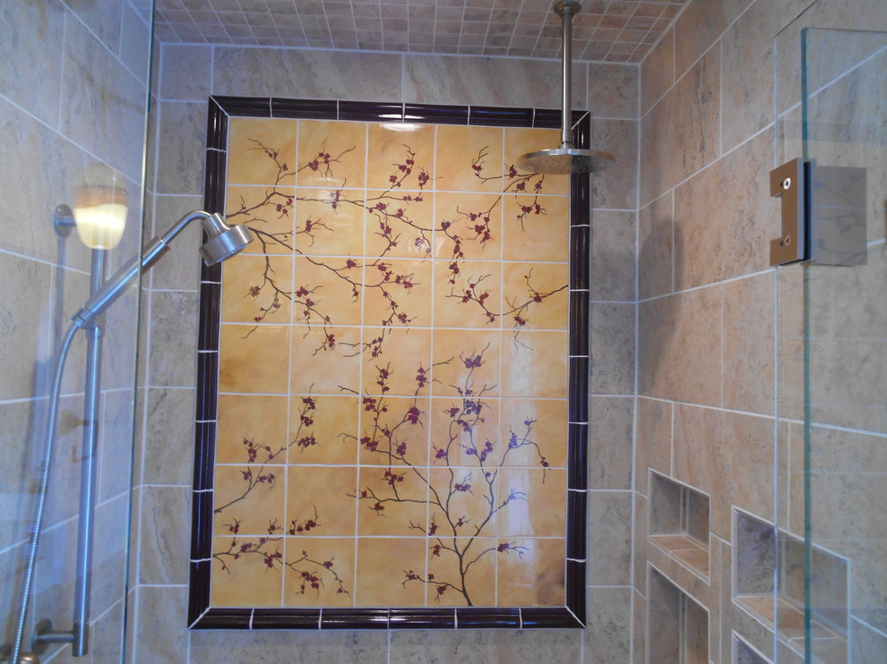 This is an example of a mid-sized contemporary master bathroom in Austin with tile benchtops, an alcove shower, a two-piece toilet, multi-coloured tile, ceramic tile, multi-coloured walls and travertine floors.