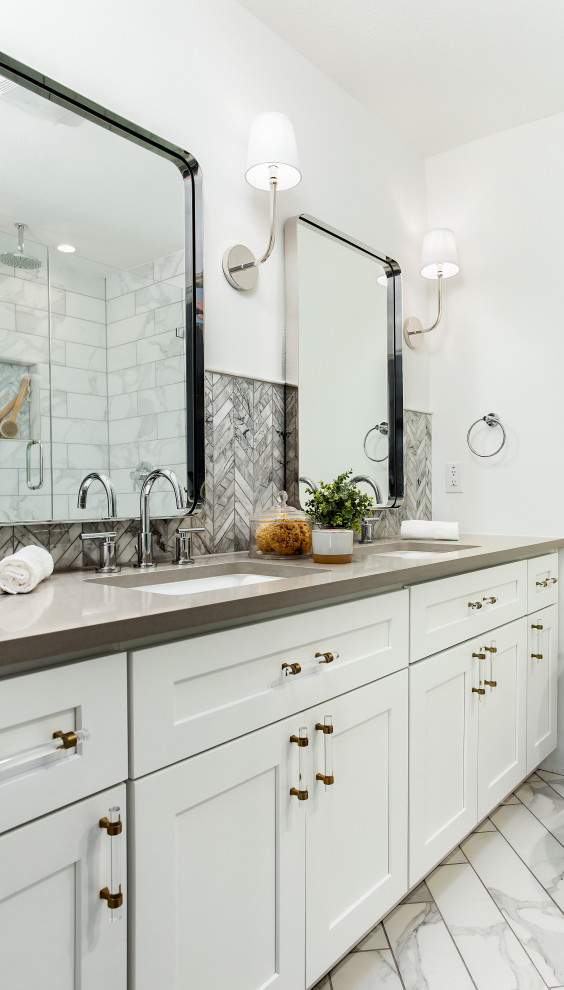 Mid-sized beach style master bathroom in Dallas with shaker cabinets, white cabinets, gray tile, mosaic tile, white walls, an undermount sink, white floor, grey benchtops and a double vanity.