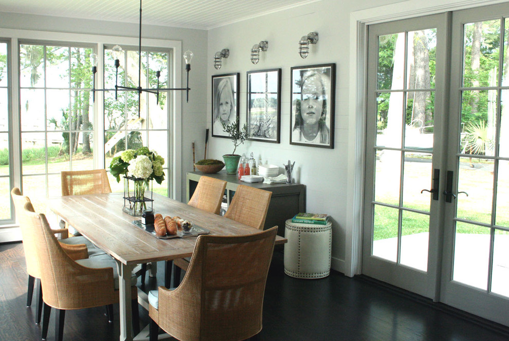 Inspiration for a country dining room in Other with grey walls.
