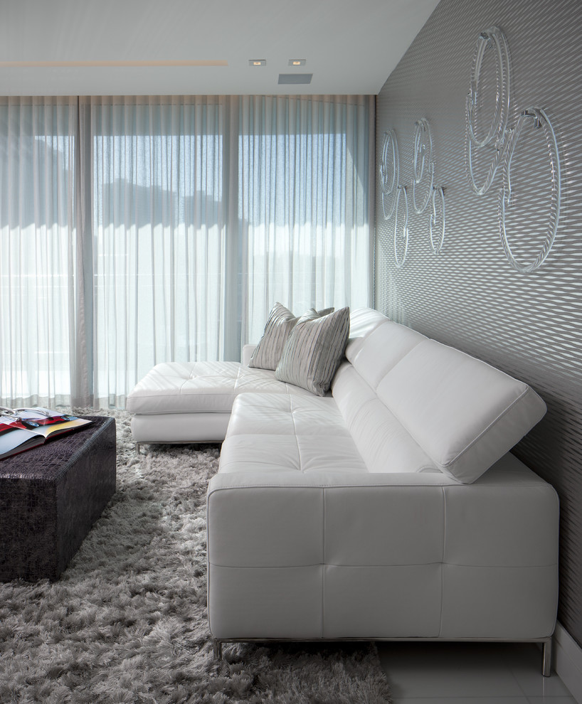 Inspiration for a mid-sized modern formal living room in Miami with grey walls.