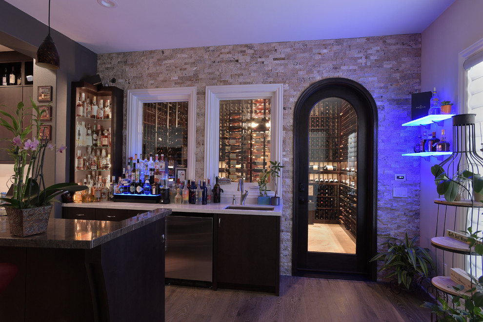 Inspiration for a large traditional wine cellar in San Diego with porcelain floors and display racks.